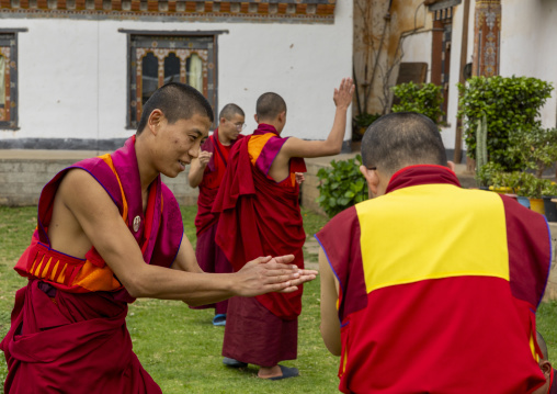Bhutanese novices monks debating in Nyenzer Lhakhang, Thedtsho Gewog, Wangdue Phodrang, Bhutan