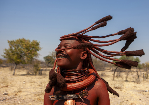 Himba tribe girl dancing, Cunene province, Oncocua, Angola