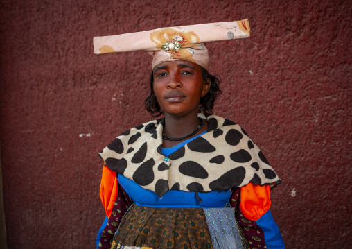 Herero woman dressed in traditional victorian style, Kunene region, Opuwo, Namibia
