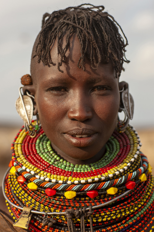Turkana tribe woman with huge necklaces and earrings, Turkana lake, Loiyangalani, Kenya