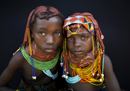 Mwila young girls with the vikeka mud necklace, Huila Province, Chibia, Angola