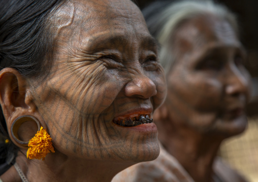 Tribal chin women with spiderweb tattoo on the faces, Rakhine state, Mrauk U, Myanmar