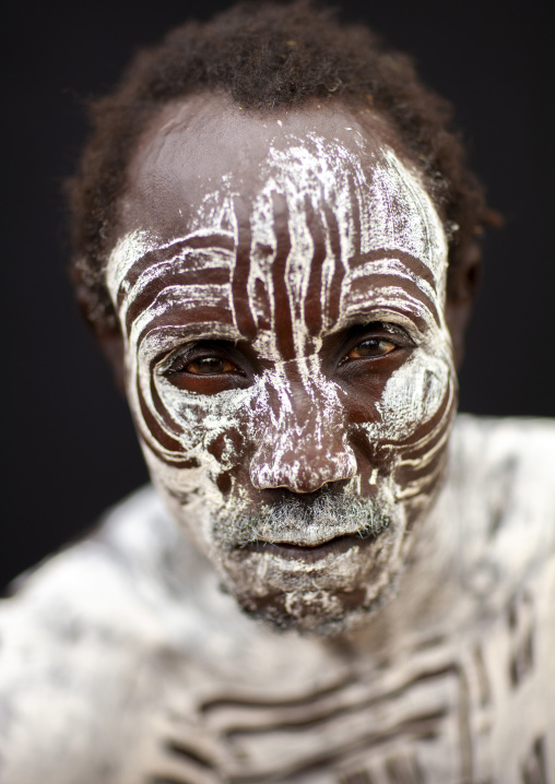 Portrait of a Karo man with white paint on face, Omo valley, Korcho, Ethiopia