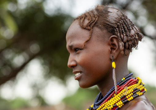 Dassanech teenage girl wearing beaded necklaces, Omo valley, Omorate, Ethiopia