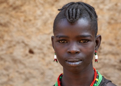 Hamer tribe girl in traditional outfit, Dimeka, Omo valley, Ethiopia