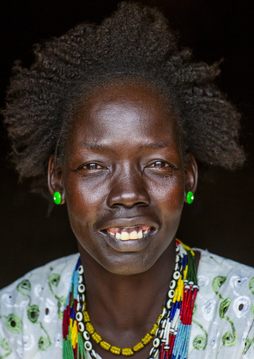 Nuer tribe smiling woman portrait, Gambella region, Gambella, Ethiopia