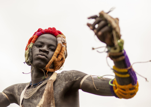 Donga stick fighter in Surma tribe, Omo valley, Kibish, Ethiopia