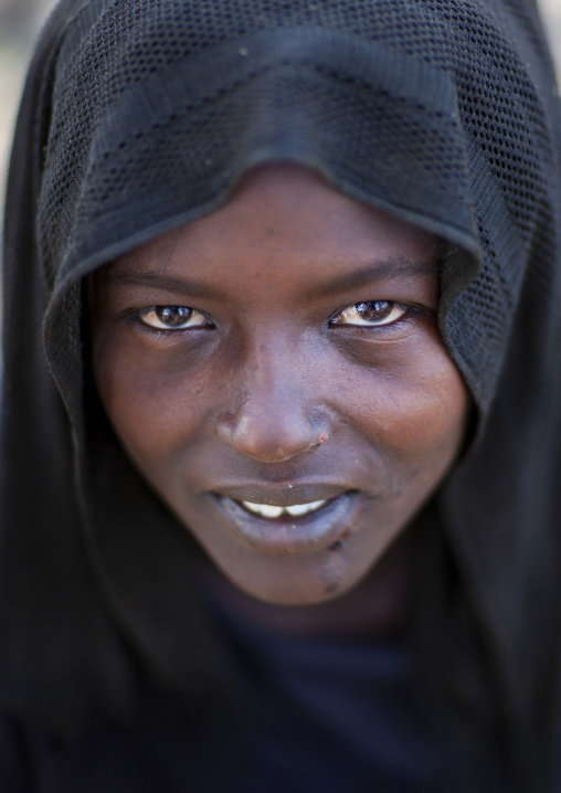 Portrait of a veiled Karrayyu young woman, Oromia, Metahara, Ethiopia