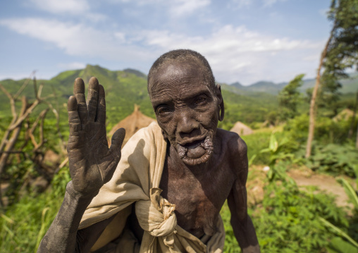 Old surma woman with the lip stretched, Kibish, Omo valley, Ethiopia