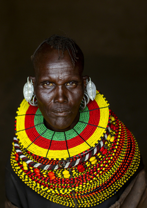 Turkana tribe woman with huge necklaces and earrings, Turkana lake, Loiyangalani, Kenya