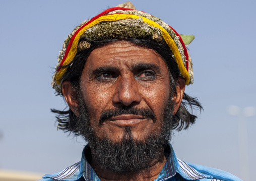 Portrait of a Flower man with garland on his head, Jizan province, Addayer, Saudi Arabia
