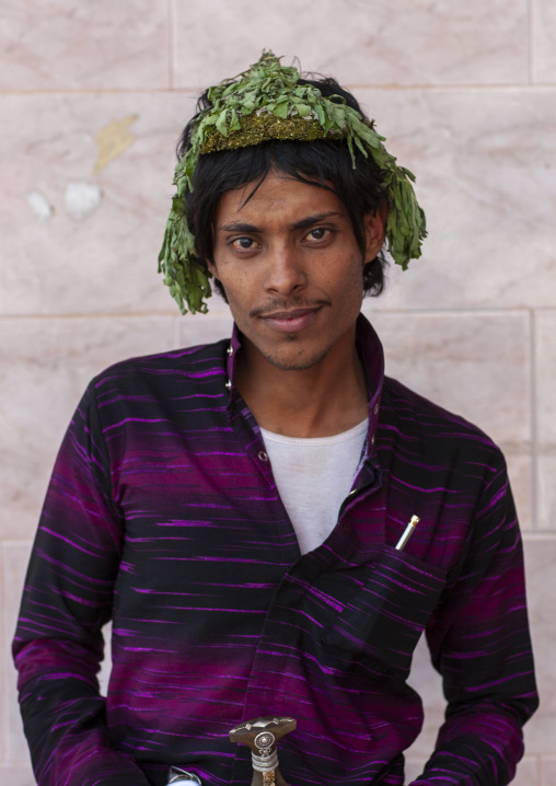 Portrait of a Flower man with garland on his head, Jizan province, Addayer, Saudi Arabia