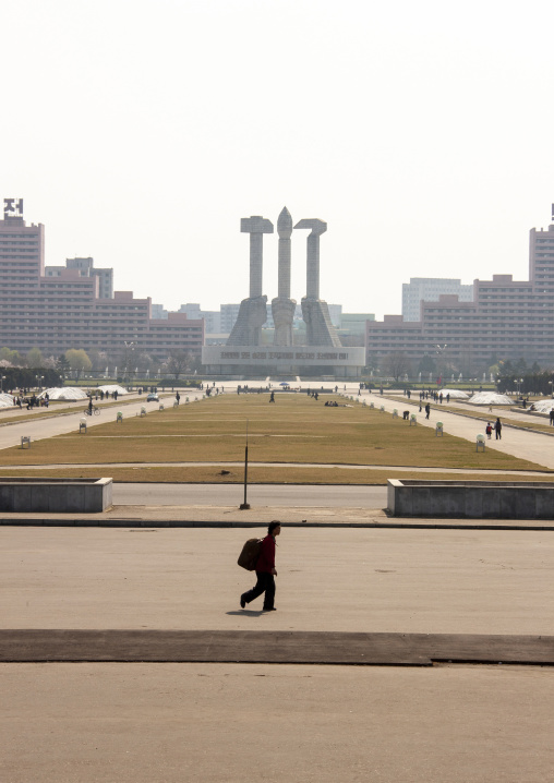 Woman in front of the monument to party founding, Directly governed city, Pyongyang, North Korea