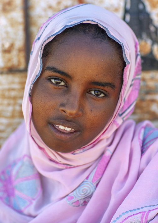 Portrait of a teenage girl in pink veil, Maroodi Jeh region, Hargeisa, Somaliland