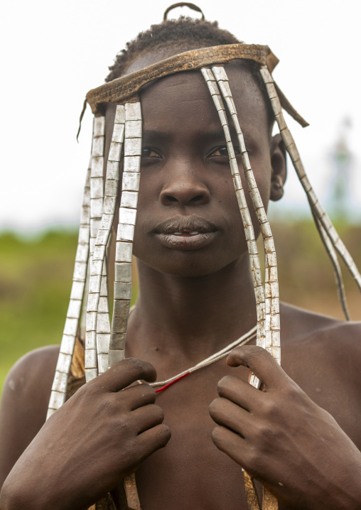 Mursi tribe woman with headgear, Omo valley, Hana Mursi, Ethiopia