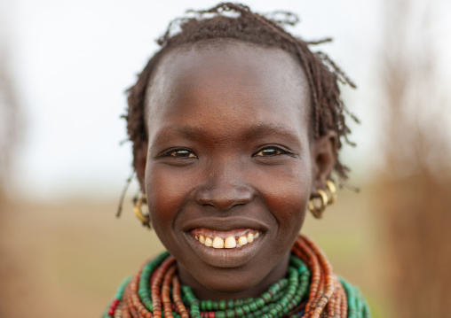 Nyangatom senior tribe woman with necklaces, Omo valley, Murile, Ethiopia