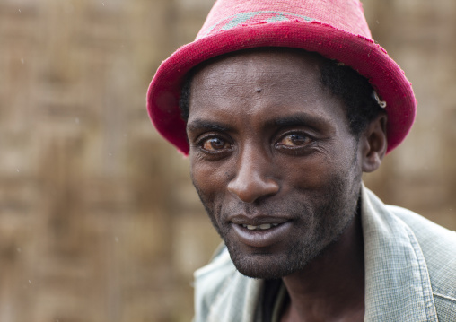 Portrait of a young Dorze tribe man with hat, Gamo Gofa Zone, Chencha, Ethiopia