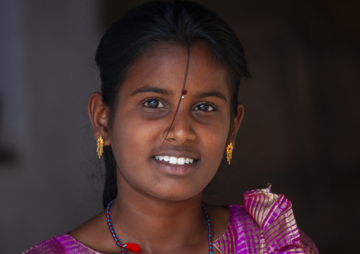 Portrait of a teenage girl with earrings, Tamil Nadu, Madurai, India