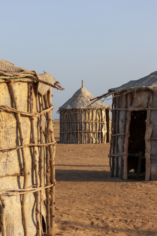 Traditional straw huts form a small desert village, Obock Region, Gorodia, Djibouti