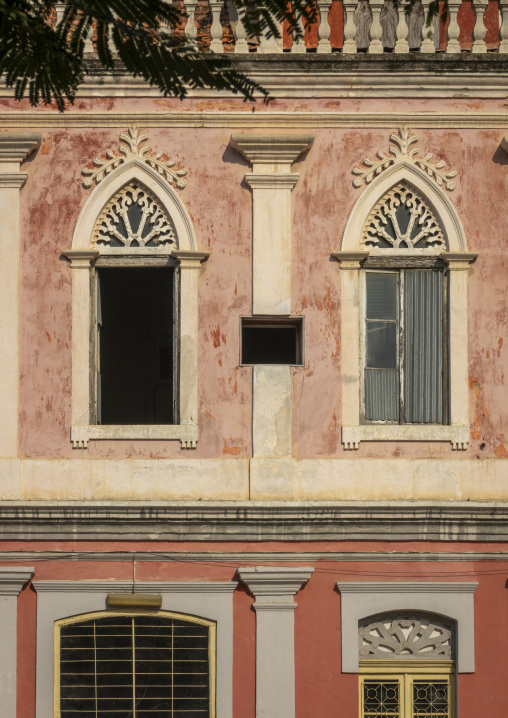 Ornate Gothic-arched windows on a weathered colonial facade, Benguela Province, Benguela, Angola