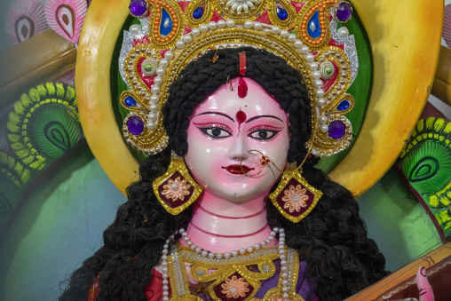 Close-up of an ornately decorated Hindu goddess idol, Dhaka Divi