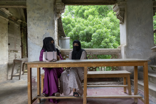Veiled women in an heritage house at Pakutia Zamindar Bari, Dhaka Division, Nagarpur, Bangladesh