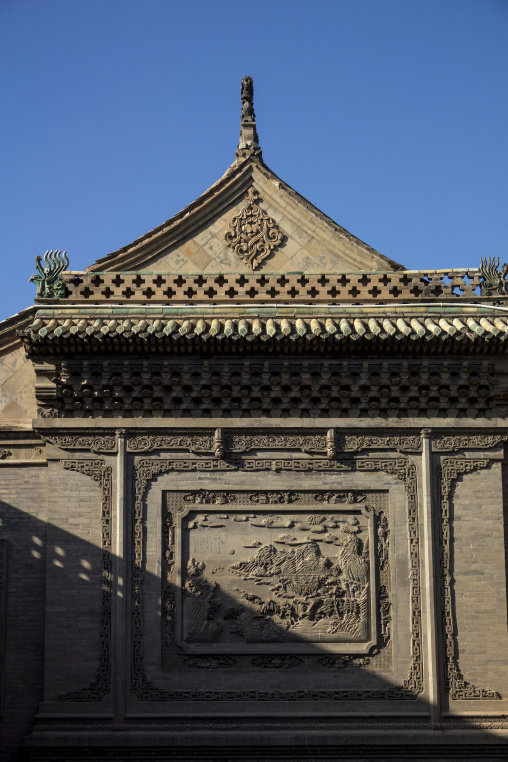 Carved stone relief panel decorates a wall at Dong Gong Guan mansion, Gansu Province, Linxia, China