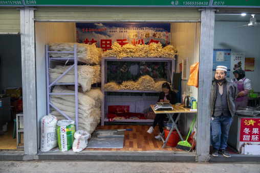 Hui Muslim vendors sell dried noodles at a shop, Gansu Province, Lanzhou, China