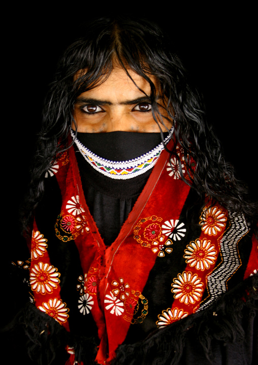 Portrait of a veiled Rashaida tribe woman with long hair, Northern Red Sea, Massawa, Eritrea