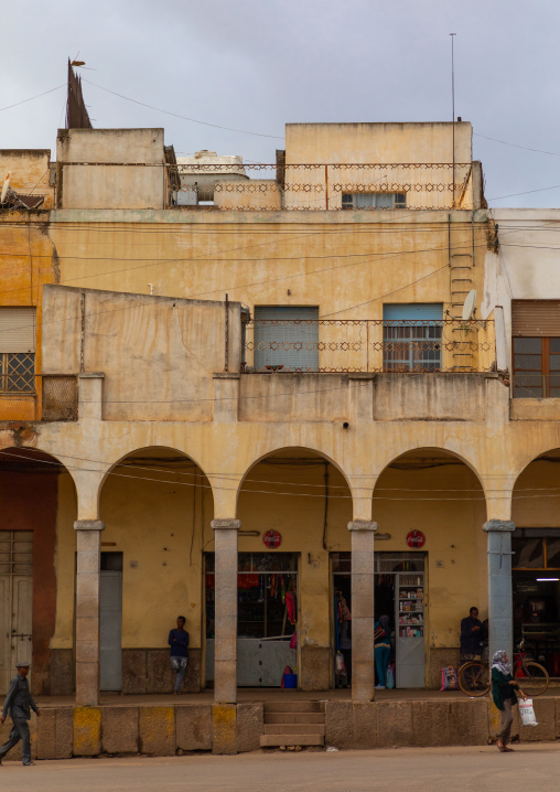 Old art deco style building with arches from the italian colonial times, Central region, Asmara, Eritrea