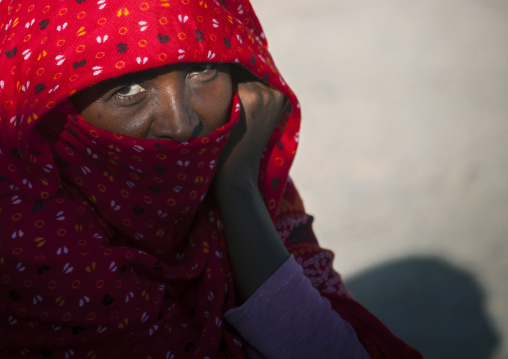 Portrait of an eritrean woman in red scarf, Anseba, Keren, Eritrea