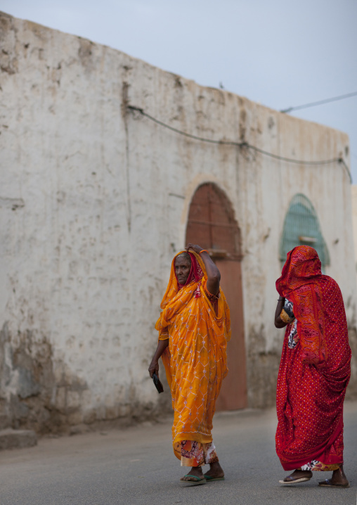 Eritrean women with colorful clothes walking in the street, Northern Red Sea, Massawa, Eritrea