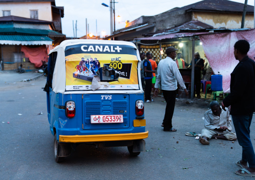 Ethiopian tuk tuk taxi with canal plus advertising, Harari Region, Harar, Ethiopia