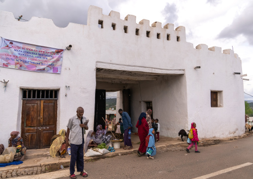 Women selling food in front of old Argoba beri gate of the town, Harari Region, Harar, Ethiopia