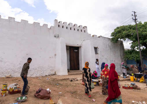 Women selling food in front of old Argoba beri gate of the town, Harari Region, Harar, Ethiopia