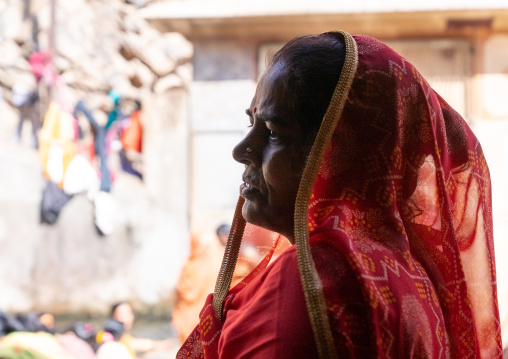 Rajasthani woman in Galtaji temple aka monkey temple, Rajasthan, Jaipur, India