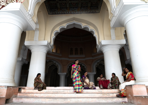 Women in the Pillared hall of Thirumalai Nayakar Palace, Tamil Nadu, Madurai, India