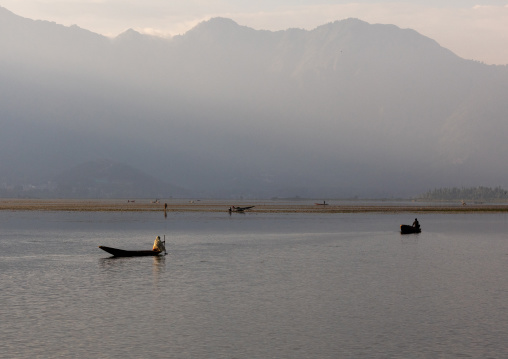 Kashmiri fishermen on Dal Lake at morning, Jammu and Kashmir, Srinagar, India