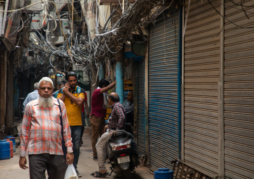 Tangled power lines in the street in old Delhi, Delhi, New Delhi, India