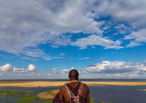 Maasai man looking the landscape, Kajiado County, Amboseli, Kenya