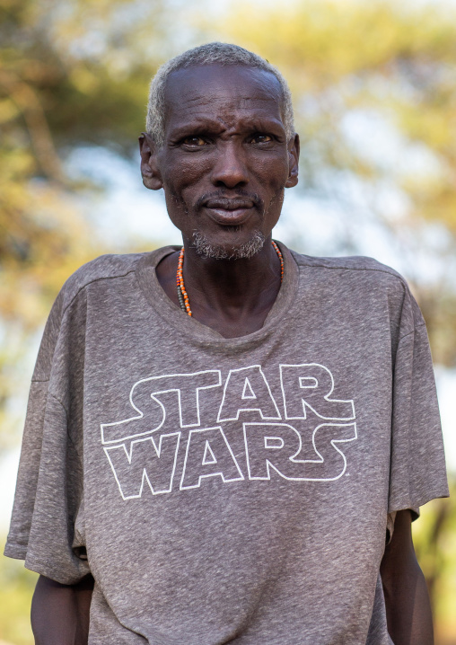Samburu man with a Star Wars tshirt, Marsabit District, Ngurunit, Kenya