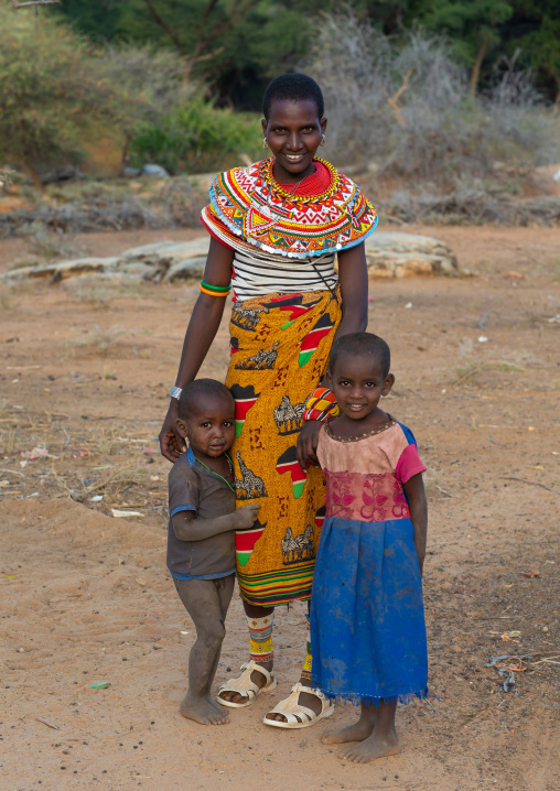 Portrait of a Samburu mother with her children, Marsabit District, Ngurunit, Kenya