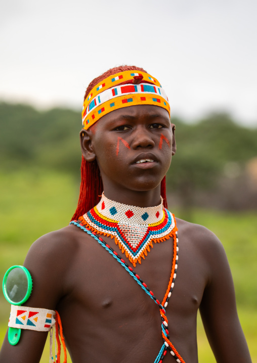 Portrait of a young samburu moran, Samburu County, Samburu National Reserve, Kenya