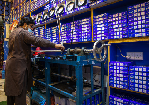 Man making agals in a shop, Riyadh Province, Riyadh, Saudi Arabia