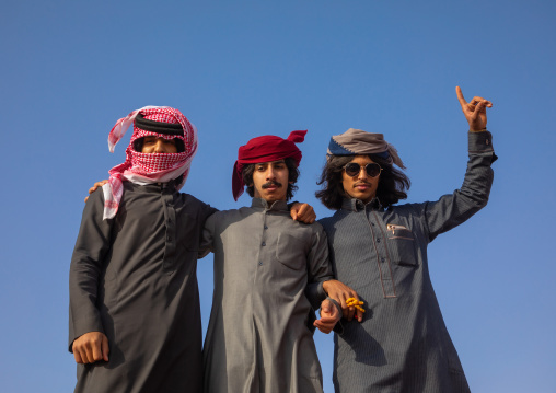 Saudi men dancing during King Abdul Aziz Camel Festival, Riyadh Province, Rimah, Saudi Arabia