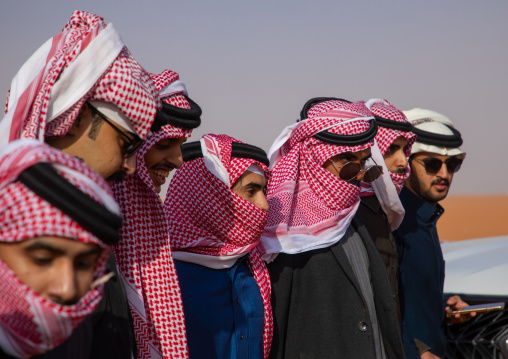 Saudi men dancing during King Abdul Aziz Camel Festival, Riyadh Province, Rimah, Saudi Arabia