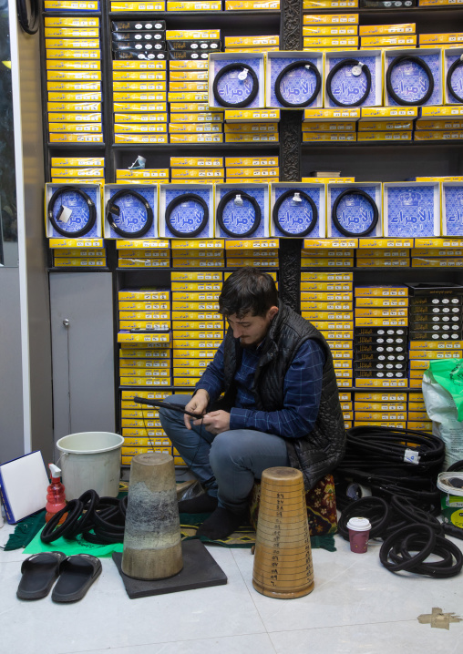 Man making agals in a shop, Riyadh Province, Riyadh, Saudi Arabia