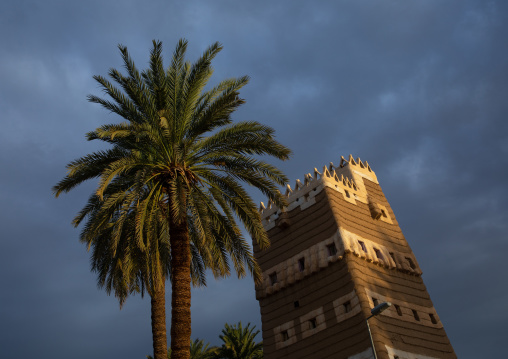 Traditional old mud house with palm trees, Najran Province, Najran, Saudi Arabia