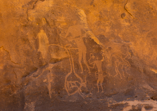 Petroglyphs on a rock depicting humans, Najran Province, Thar, Saudi Arabia