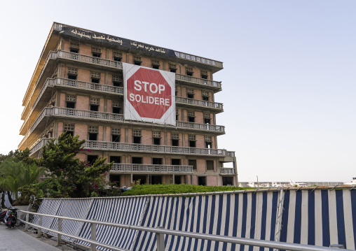 Sign at the abandonned St George hotel protesting against Solidere company, Beirut Governorate, Beirut, Lebanon